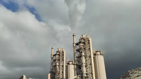4K UHD: Smoke Emitting from Cement Factory Preheater Tower. 動画素材 331891920