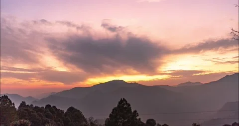 4k UHD stunning sunset timelapse of a mountain from day to night. Stock Footage 226516676