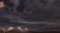 4K UHD subtle cumulus thunderheads behind mountains night time lapse tight 4k or 4k+ Resolution