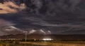 4K UHD subtle cumulus thunderheads behind mountains night time lapse 4k or 4k+ Resolution