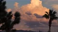 4K UHD sunset colored clouds over mountain time lapse tight 4k or 4k+ Resolution