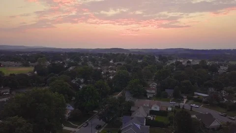 4k UHD Sunset over a small town ariel Stockbeeldmateriaal 78127488
