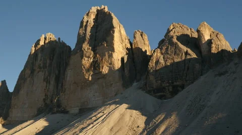 4k UHD sunset three peaks to mountain refuge Locatelli pan 11505 Stock Footage 42466036