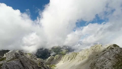 4K UHD timelapse_cloudy sky above san pellegrino pass in Italy Stock Footage 165397211