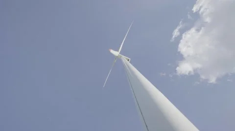 4K UHD Wind mill against blue sky with cloud Video stock 65213188