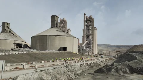 4K UHD: Workers Planting Trees Near Massive Cement Factory. Stock Footage 331926493