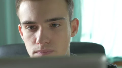 4k UHD - Young man browsing on a tablet pc Stock Footage 46817752