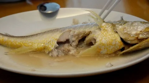 4k Ultra HD time lapse on eating Chinese-style steamed fish Stock Footage