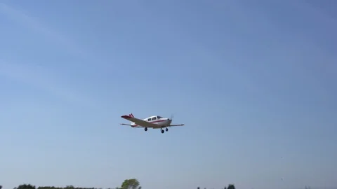 4k Ultralight Aircraft Lands In A Small Country Airport Stock Footage