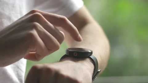 4K Using Smartwatch By Making Gestures Outdoor Stock Footage 50229625