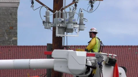 4K Utility electrical worker repairs phone pole wires Video stock 90931991