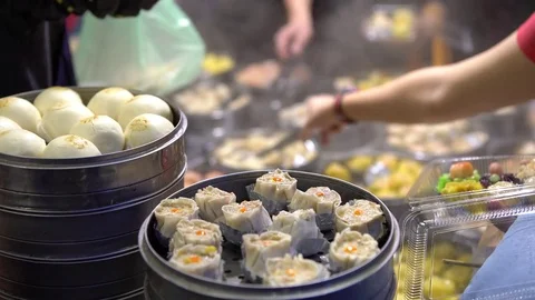 4K Vendor selling Dumpling and Shaomai in Asian Street Food Market of Taiwan-Dan Stock Footage 75769061