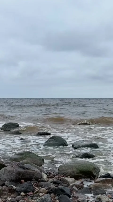 4K Vertical Baltic Sea Waves Hitting Rocky Shore with Natural Sound Stock Footage 321650446