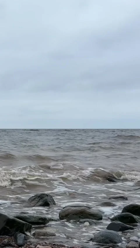 4K Vertical Baltic Sea Waves Washing Over Shoreline Stones with Natural Sound Stock Footage 321650453