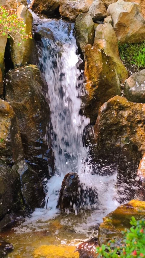 4K Vertical Cinematic B-roll footage slow motion waterfall rocky stream  Stock-Footage 307431471