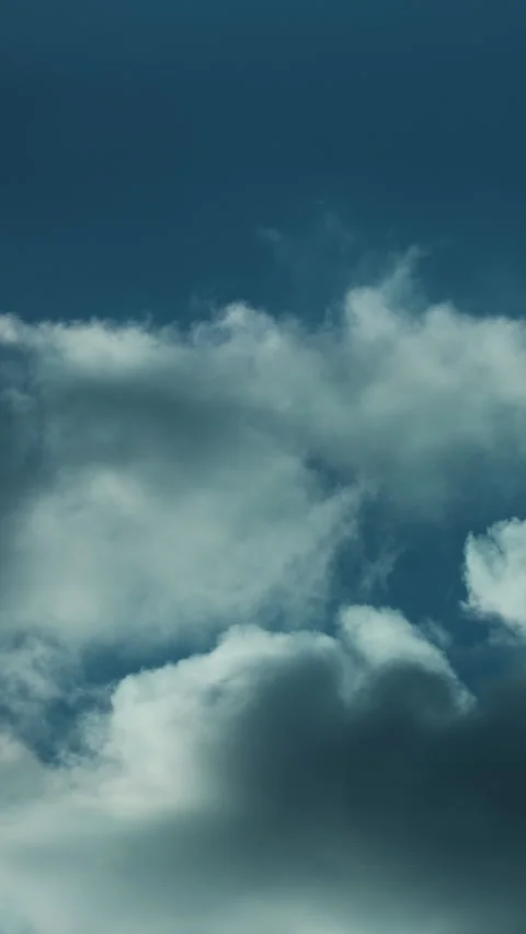 4K Vertical Deep Blue Sky and Moving Clouds Timelapse Stock Footage 318442366