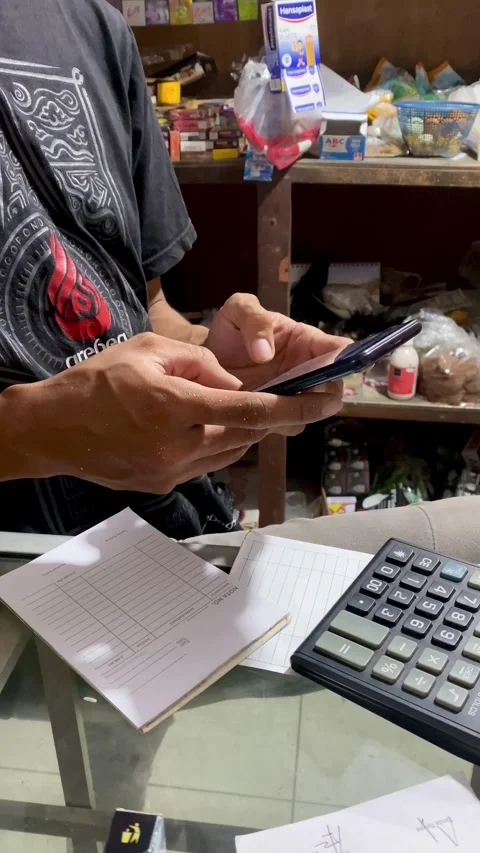 4K Vertical Mobile Payment Transaction in Small Local Shop Stock Footage 330000279