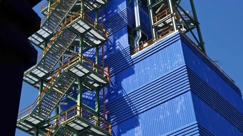 4K Vertical Panning Video of Large Industrial Plant Structure Stock Footage 297919632