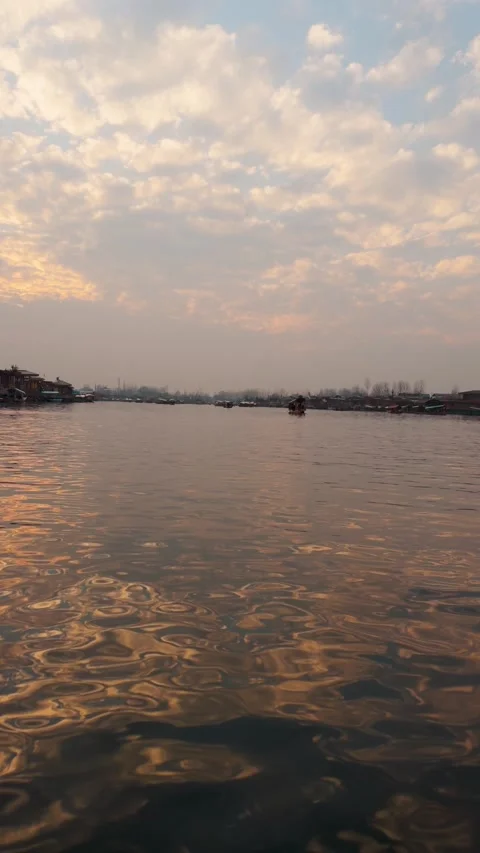 4K vertical shot of Dal Lake during sunset at Srinagar, Kashmir, India. Reflecti Stock Footage 302916984