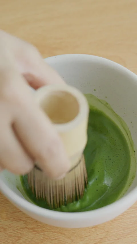 4K Vertical slow motion relaxing weekend lifestyle, making homemade matcha Stock Footage 341170278