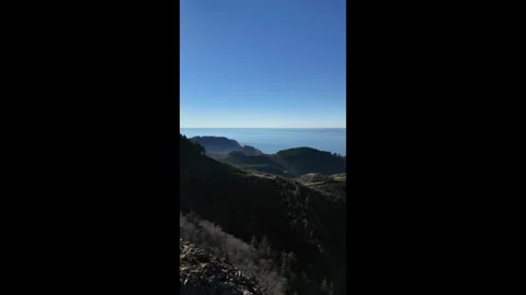 4K vertical smooth hiking panning footage in Oregon Coast, ocean mountain view Stock Footage 327366508