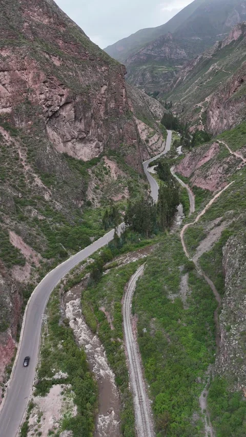 4K | Vertical UHD Car Driving On a Windy Mountain road Stock-Footage 333311646