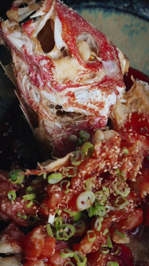 4K vertical video asian deep fried snapper with raspberry balsamic sauce Stock Footage 315395526