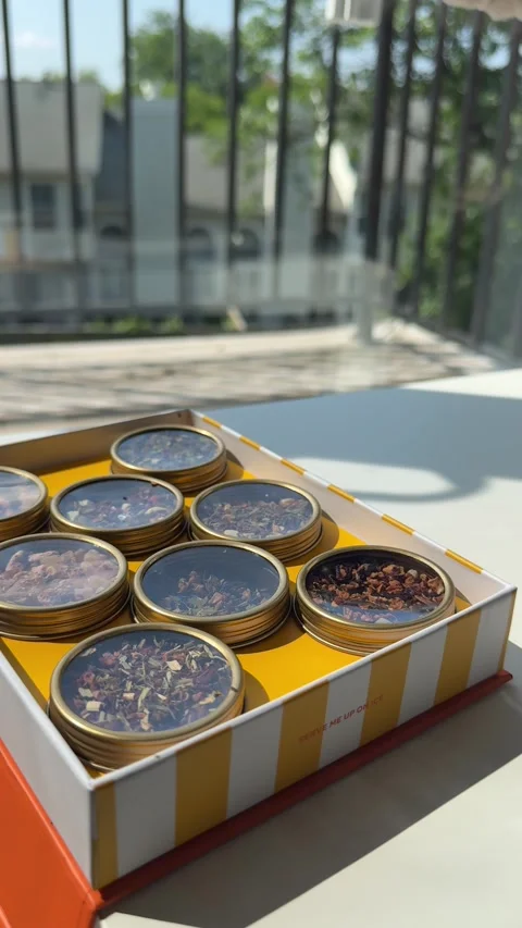 4K vertical video of an assortment of craft teas in different packages Stock Footage 342071744