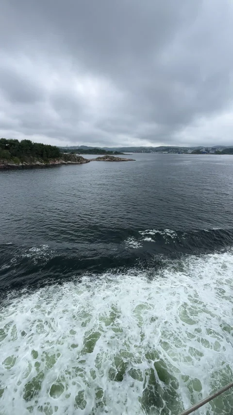 4K Vertical video of cold severe North Sea waves with ferry propeller traces on Stock Footage 319967469
