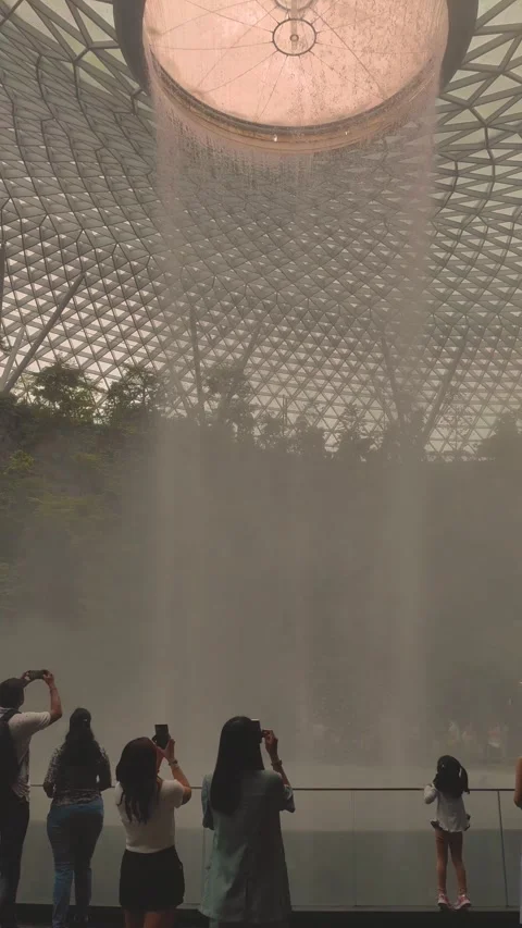 4K vertical video footage of iconic rain vortex dome waterfall in Singapore Stock Footage 314283679