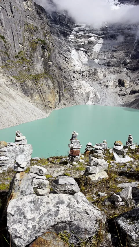 4K vertical video shot of Sabai Tso glacial lake at cca 4350m stones Stacked in Video stock 255296177