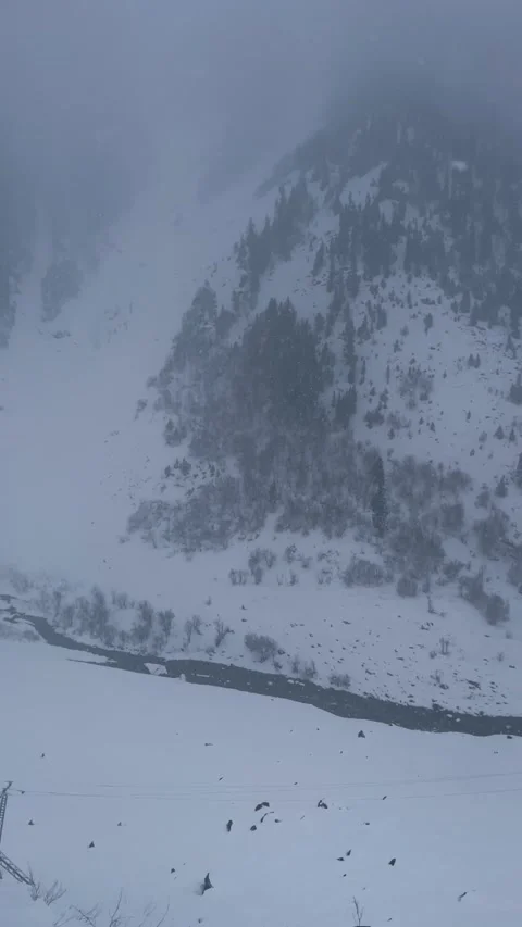 4k vertical winter river in snowy winter landscape Stock Footage 327690310