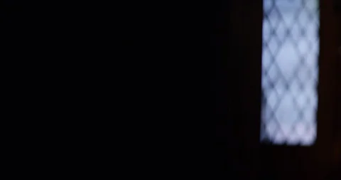 4k, Vicar showing the middle finger to camera while praying inside a church Stock Footage 128398844