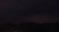 4K Video 30p - Mountain silhouettes show as lightning strikes -1 Video HD