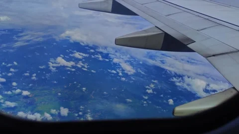 4K video aerial view of the cloudscape through an airplane window Stock Footage 255104555