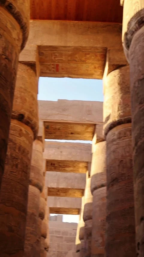 4K video of ancient Egyptian temple columns covered in hieroglyphs Stock Footage 335030203