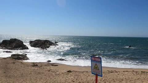 4K video of a beach with strong waves in Vila Nova de Gaia, Porto, Portugal, Stock Footage 283455790