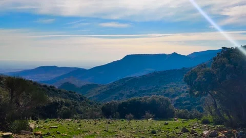 4K VIDEO FOR THE BEAUTIFUL MOUNTAINS THU SUN THE GARDEN LANDSCAPE PHOTOGRAPHY Stock Footage 130579635