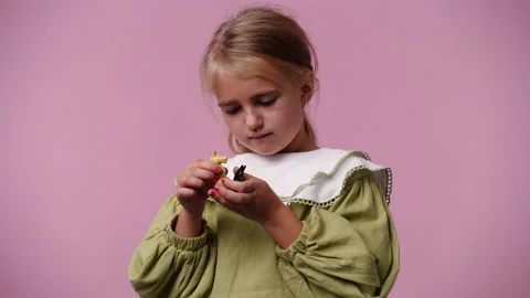 4k video of blank emotion of one girl on yellow background. Stock Footage 237286953