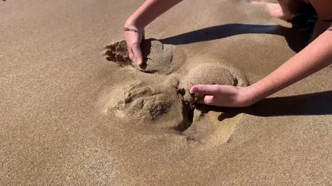 4k video. boy making sand castle on the beach Stock Footage 164202015