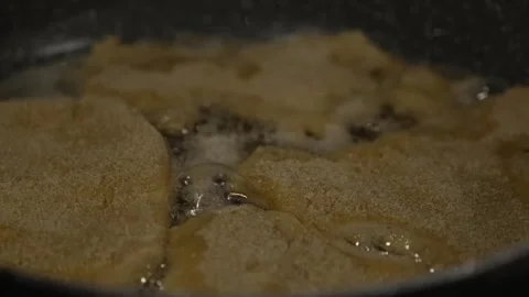 4K Video Breaded Food Fillets Sizzling and Frying in Hot Bubbling Oil close.. Stock Footage 331750796