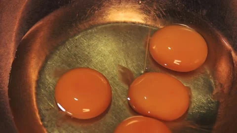 4k video breaking eggs and placing them in a bowl. Food preparation concept. Stock Footage 262653546