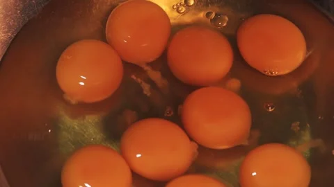 4k video breaking eggs and placing them in a bowl. Food preparation concept. Stock Footage 262653547