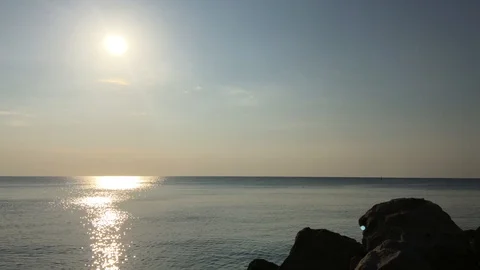 4k video Calm ocean or sea sunrise with sun up and very soft tranquil waves Stock Footage 115070698