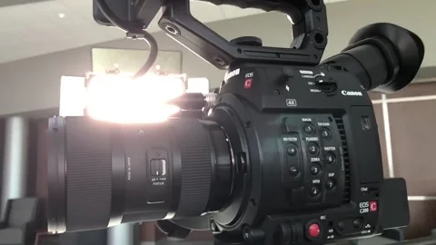 4k video camera on tripod with production lights  Stock Footage 187791651