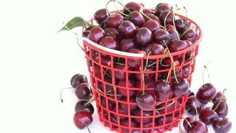 4K video with  cherry in a red plastic basket Stock Footage 76983321