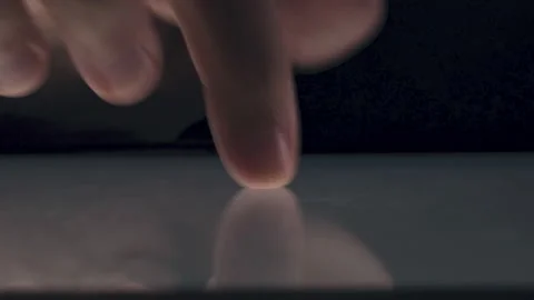 4K Video close up Finger touch on Tablet screen Mock up with light. Concept f Video stock 134296875