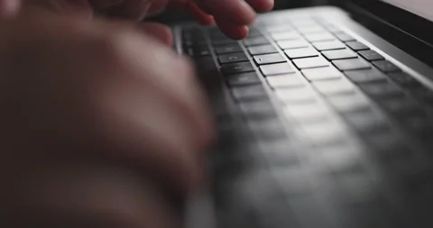 4K Video close up hand typing on keyboard notebook. Concept for coding and te Stock Footage 169322707
