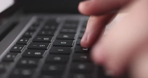 4K Video close up hand typing on keyboard notebook. Concept for coding and te Video stock 169322862