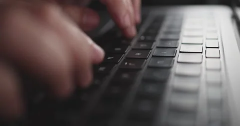 4K Video close up hand typing on keyboard notebook. Concept for coding and te Stock Footage 170914228